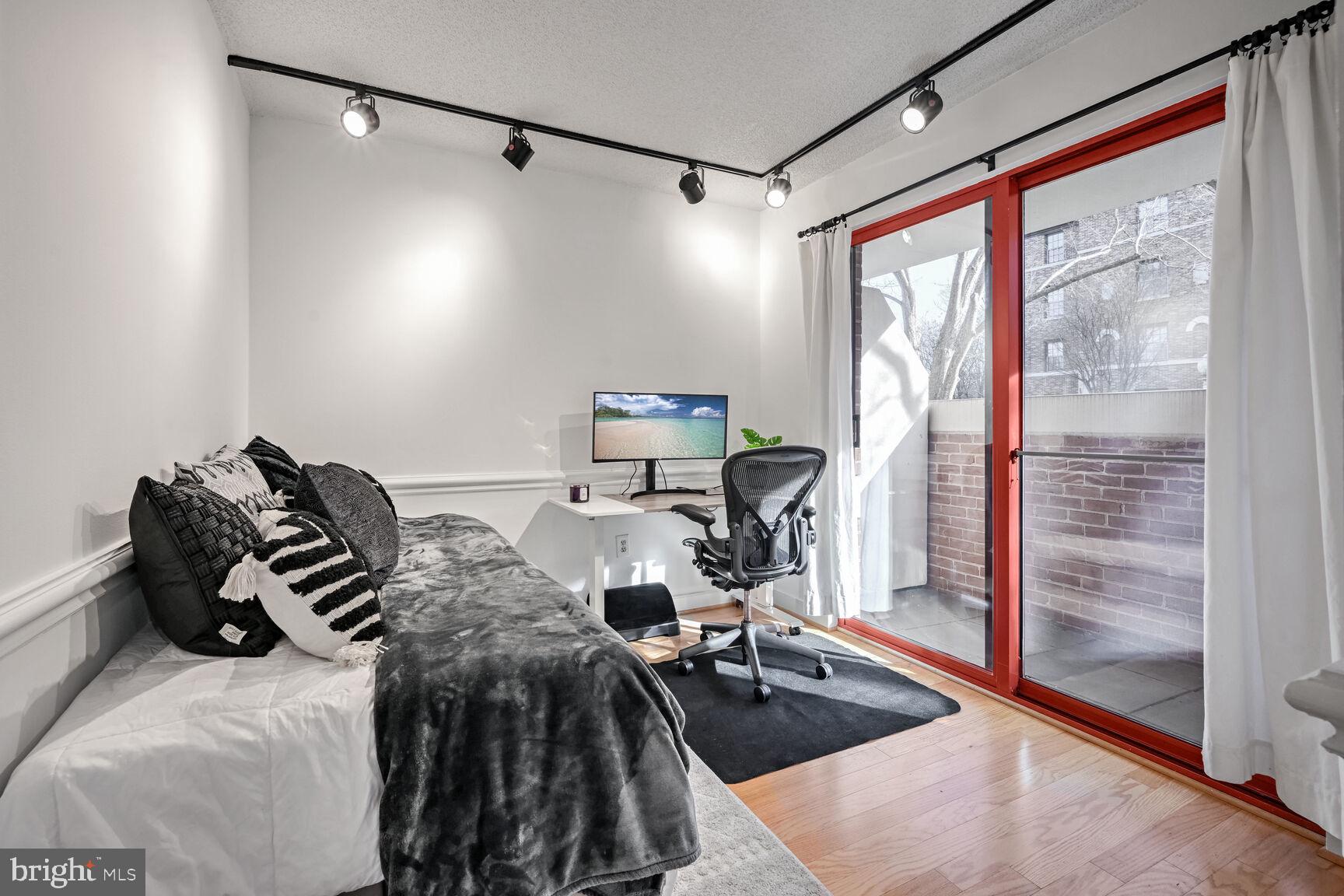 2301 N Street Northwest, Unit 104 Washington, DC 20037 - Photo 15 of 22 a view of a livingroom with furniture