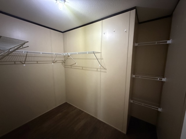 219 The Ranch Road, Unit B Del Valle, TX 78617 - Photo 9 of 14 Primary bedroom walk-in closet