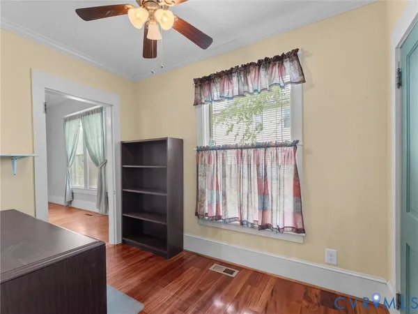 a view of cabinets and wooden floor