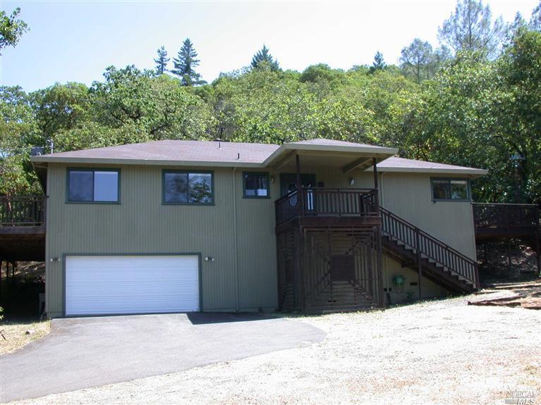 21455 Chianti Road Geyserville, CA 95441 - Photo 1 of 1 a front view of a house with a yard