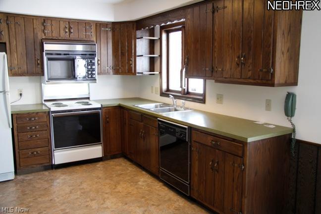 398 Herbert Road Akron, OH 44312 - Photo 13 of 25 View of kitchen with appliances and new flooring