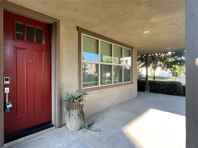 a view of a entryway door front of a house