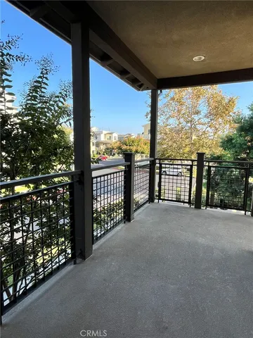 a view of a city street from a balcony
