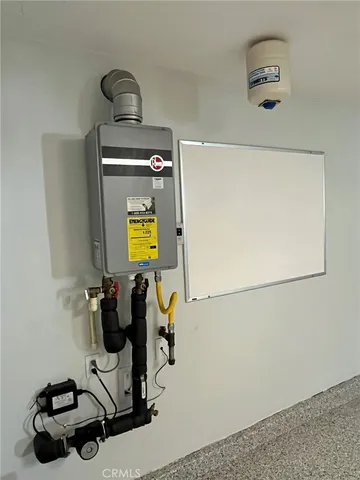 a view of a storage & utility room with a washer and dryer