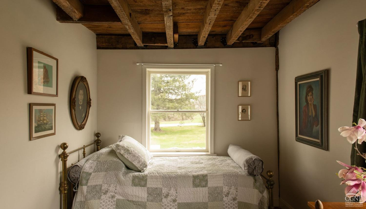 50 Lockwood Road Craryville, NY 12521 - Photo 15 of 25 a bed room with a bed and a window