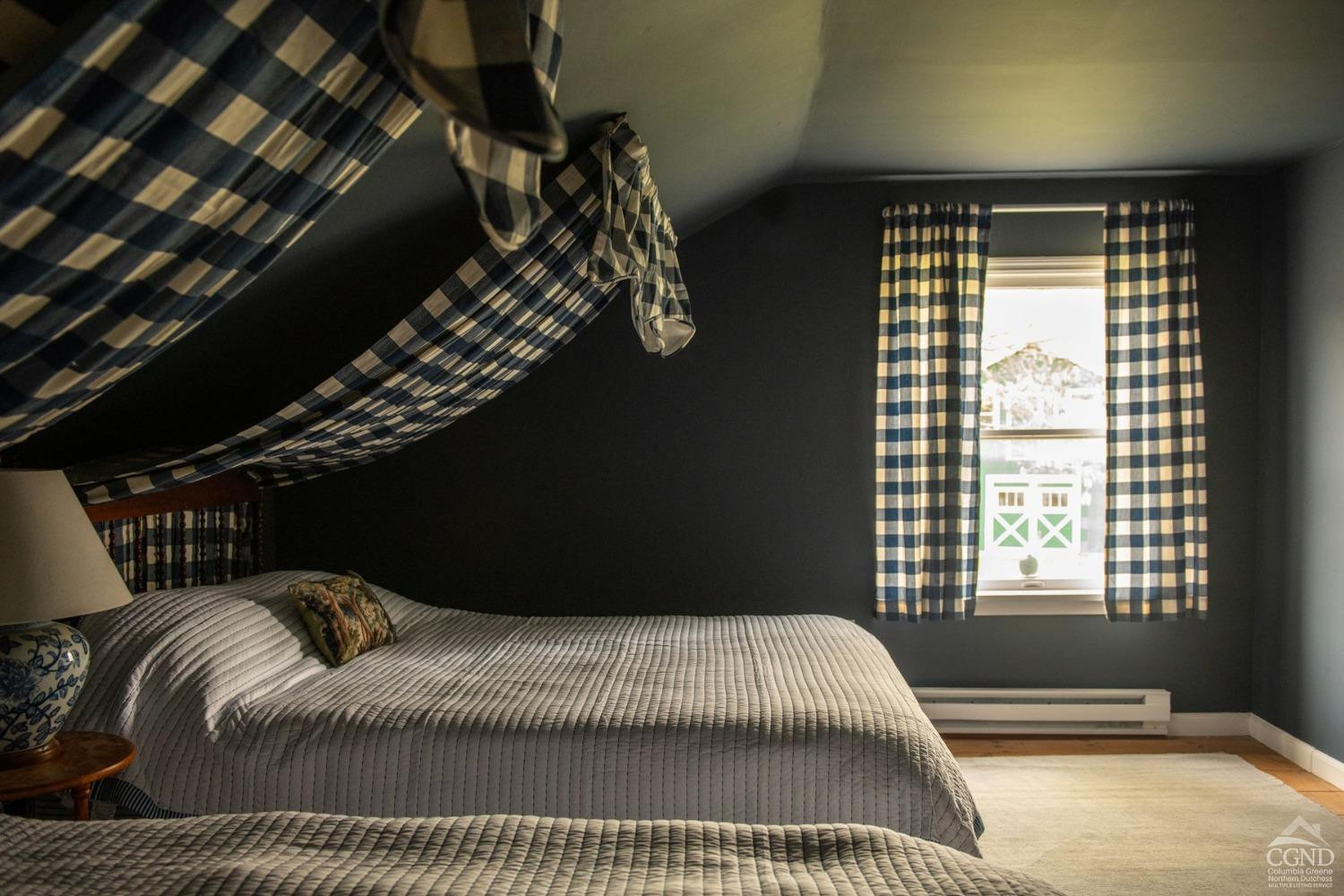 50 Lockwood Road Craryville, NY 12521 - Photo 19 of 25 a bedroom with a bed and a window