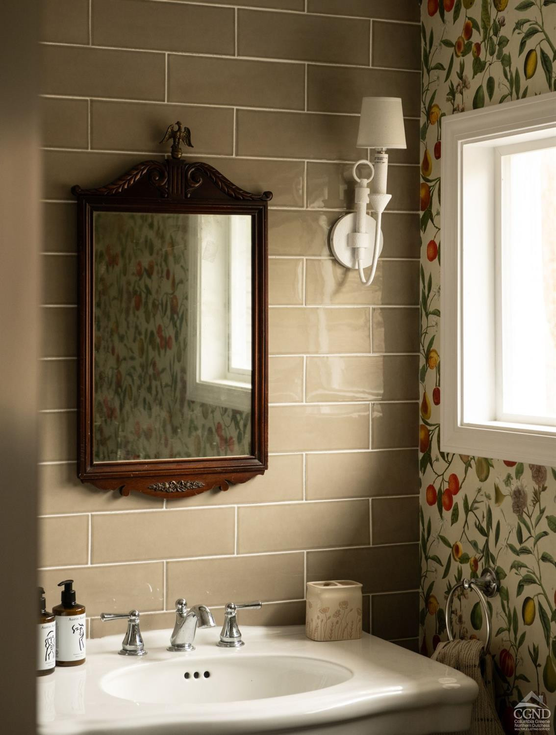 50 Lockwood Road Craryville, NY 12521 - Photo 22 of 25 a bathroom with a sink and a mirror