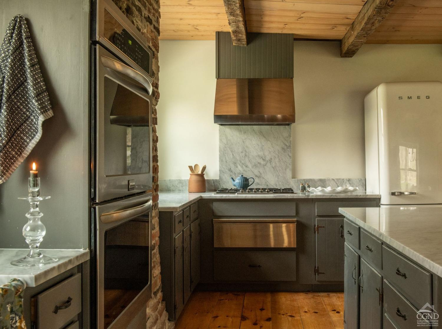 50 Lockwood Road Craryville, NY 12521 - Photo 7 of 25 a kitchen with stainless steel appliances granite countertop a sink stove and refrigerator