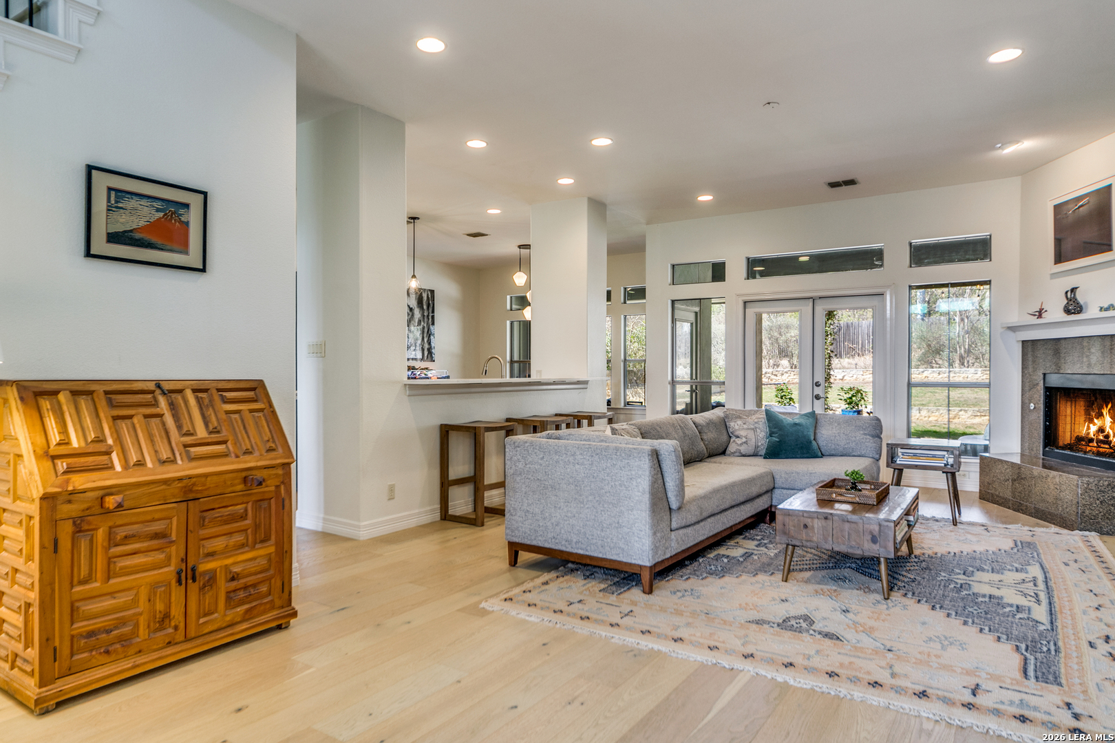 643 Ridge San Antonio, TX 78258 - Photo 11 of 45 a living room with furniture and a fireplace