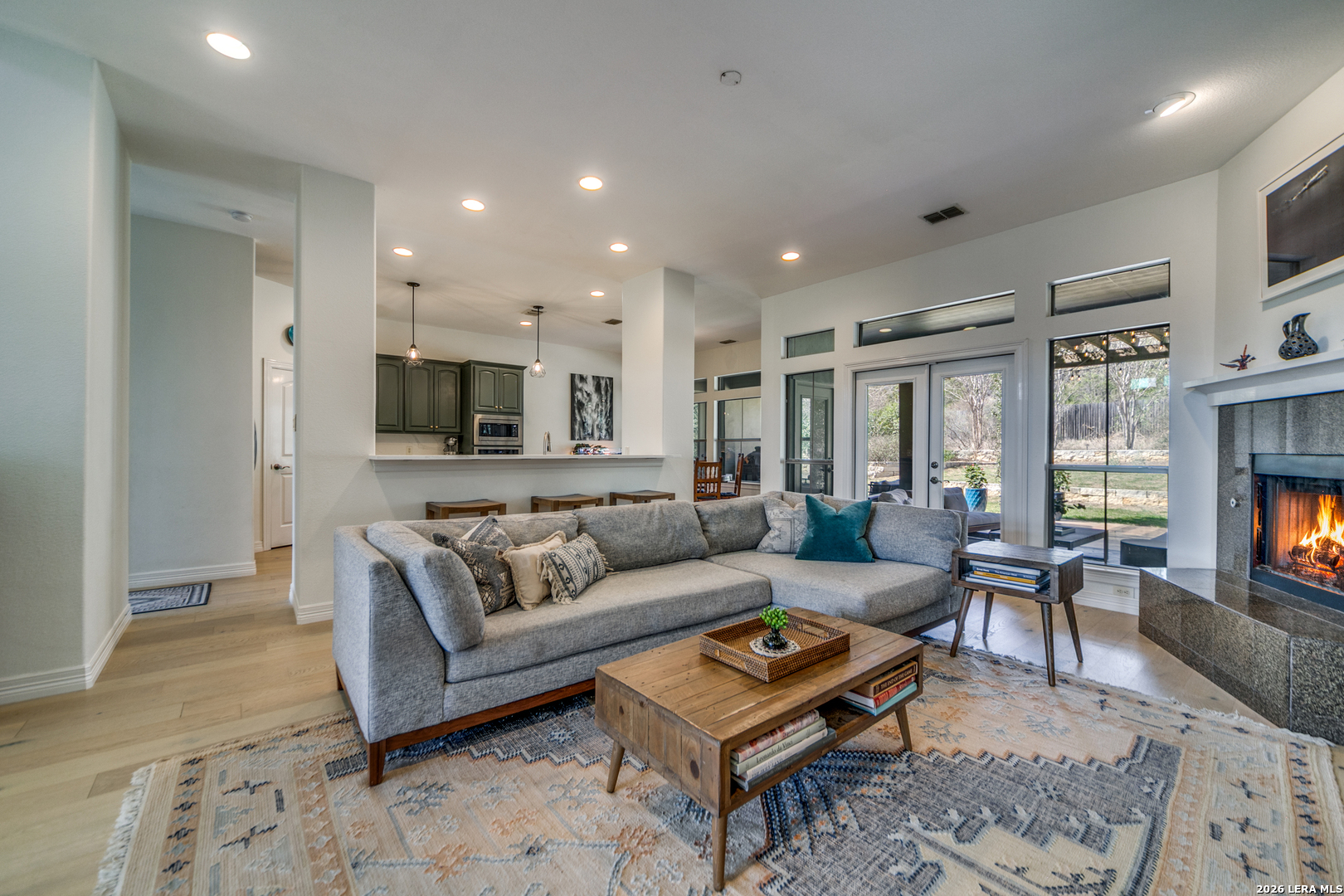 643 Ridge San Antonio, TX 78258 - Photo 12 of 45 a living room with furniture and a fireplace