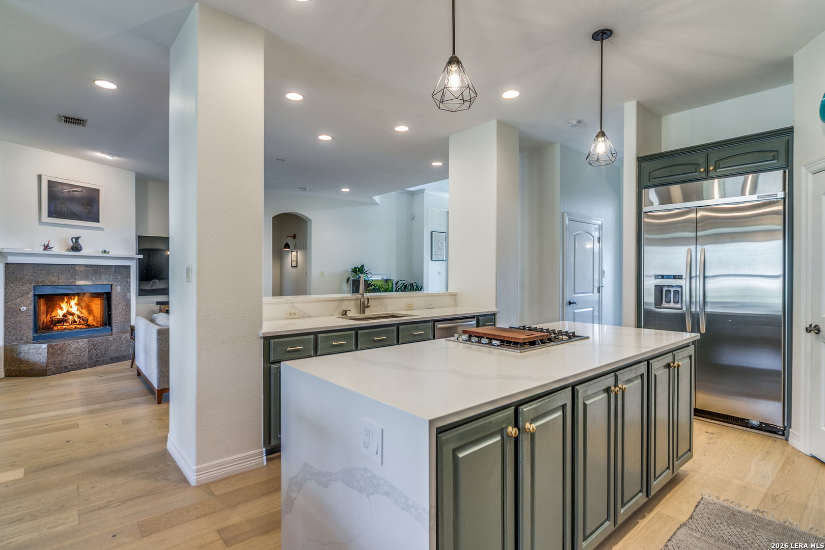 643 Ridge San Antonio, TX 78258 - Photo 14 of 45 a kitchen that has a lot of cabinets a sink and dishwasher in it
