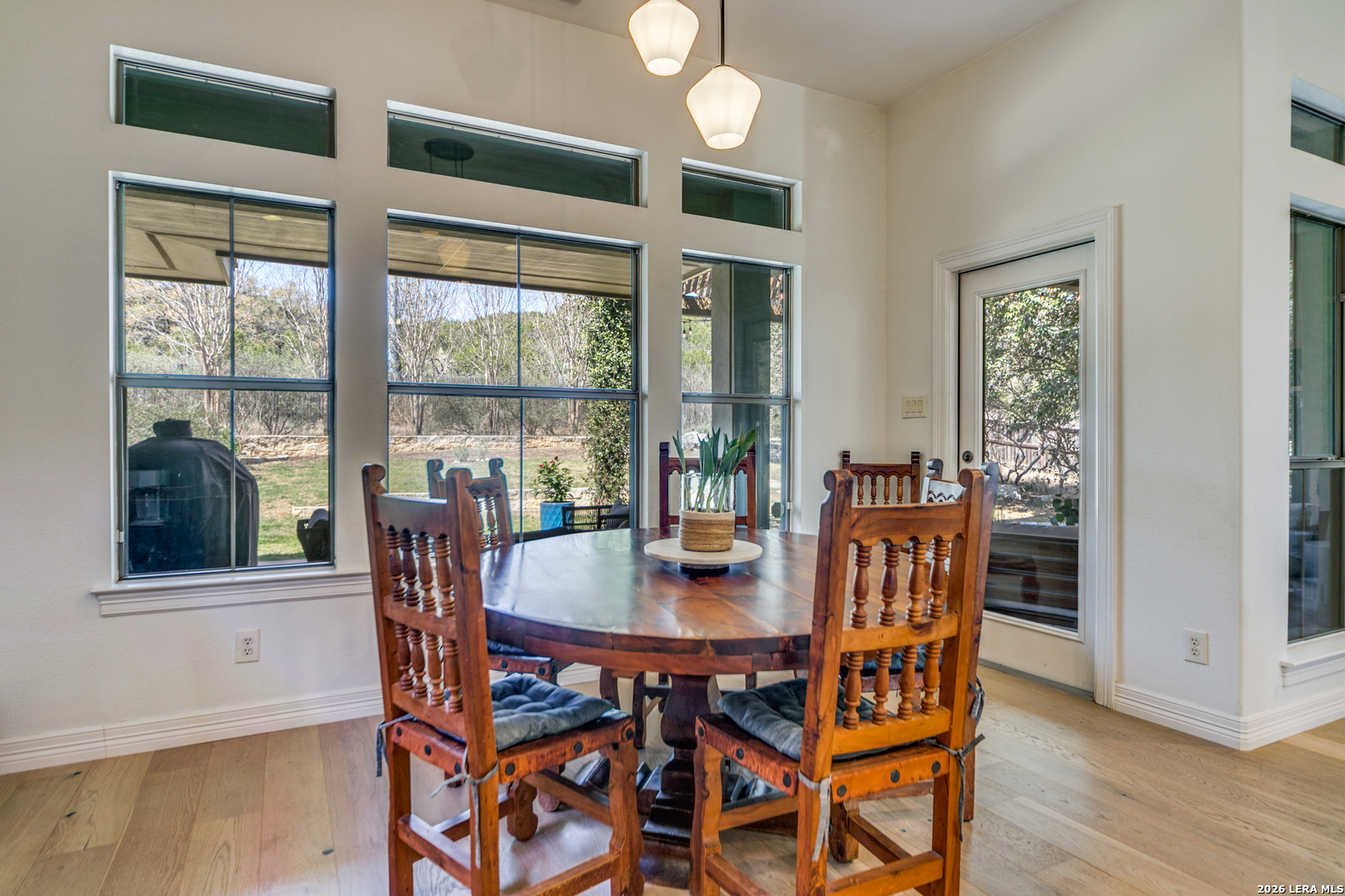 643 Ridge San Antonio, TX 78258 - Photo 22 of 45 a view of a dining room with furniture window and wooden floor