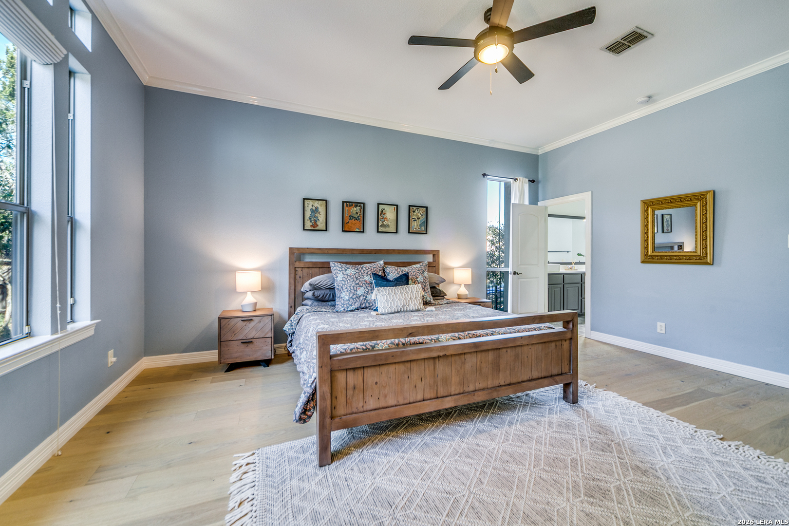 643 Ridge San Antonio, TX 78258 - Photo 29 of 45 a bedroom with a bed couch and window