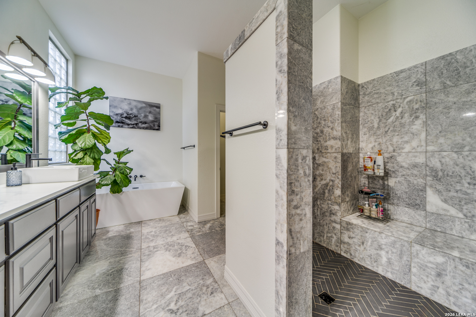 643 Ridge San Antonio, TX 78258 - Photo 31 of 45 a bathroom with a bathtub and shower