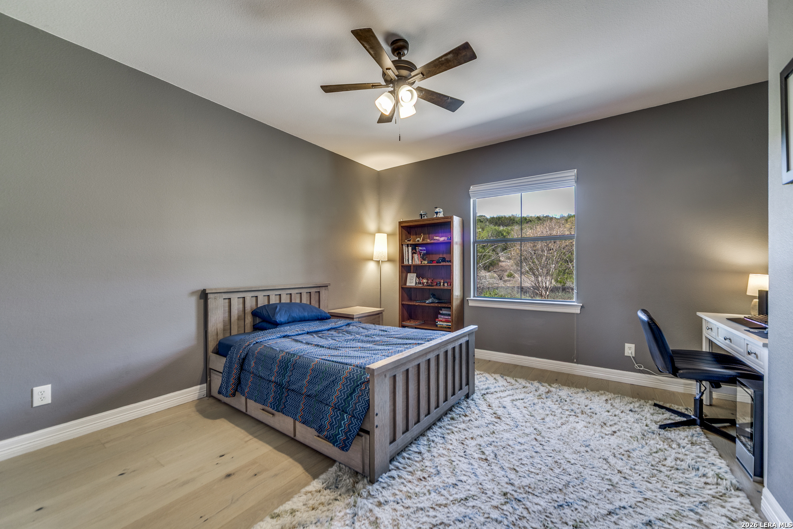 643 Ridge San Antonio, TX 78258 - Photo 35 of 45 a bedroom with a bed and a window