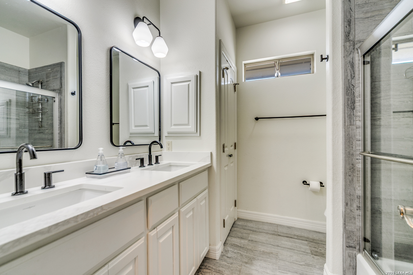 643 Ridge San Antonio, TX 78258 - Photo 37 of 45 a bathroom with a double vanity sink mirror and double