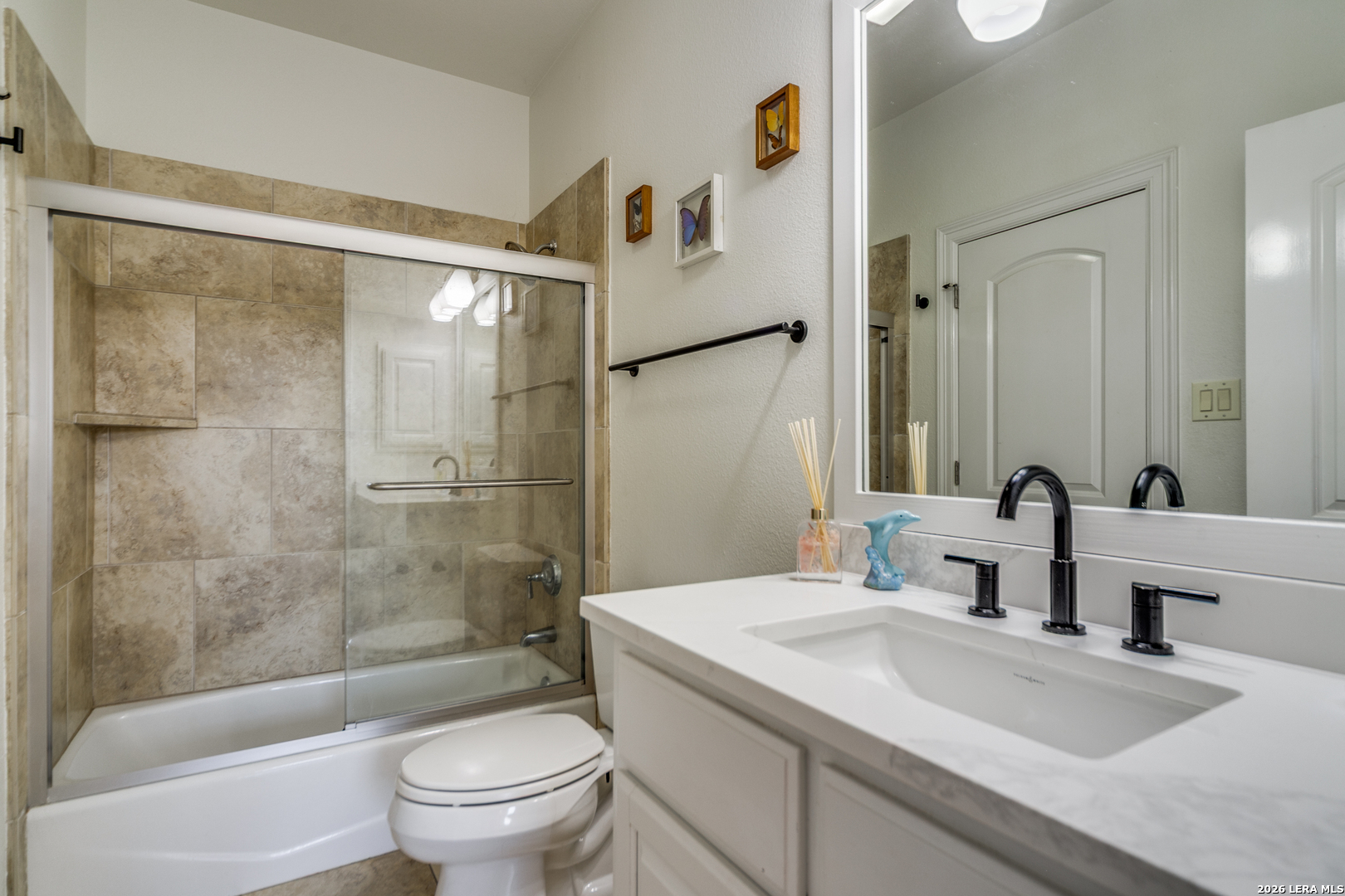 643 Ridge San Antonio, TX 78258 - Photo 40 of 45 a bathroom with a sink toilet and shower