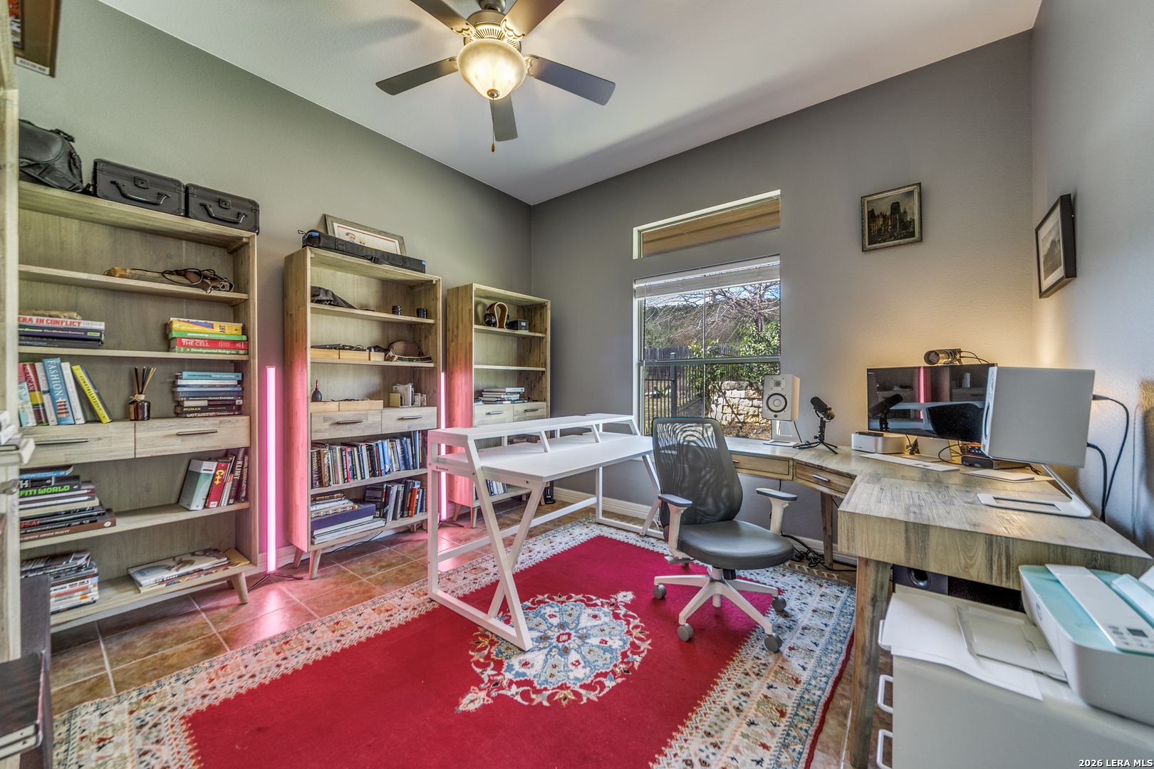 643 Ridge San Antonio, TX 78258 - Photo 41 of 45 a living room with furniture and a book shelf