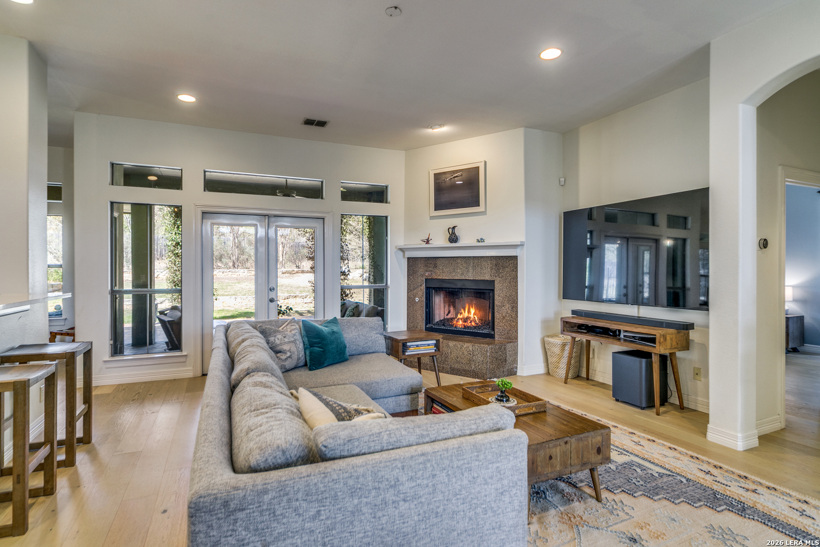 643 Ridge San Antonio, TX 78258 - Photo 10 of 45 a living room with furniture and a fireplace