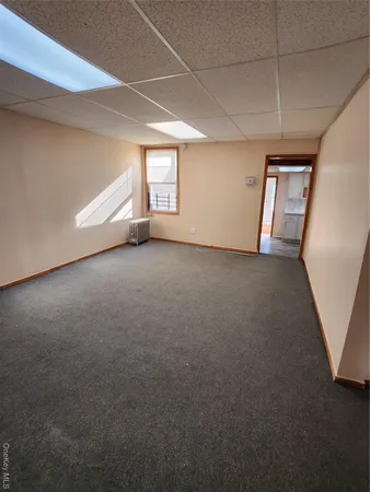 a view of a hallway with a window