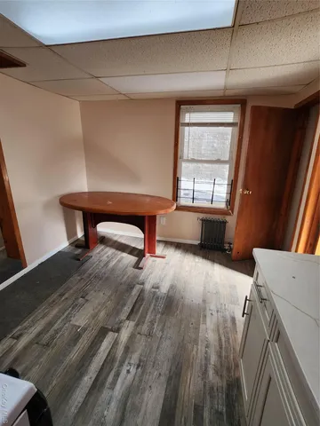 a room with furniture and a window