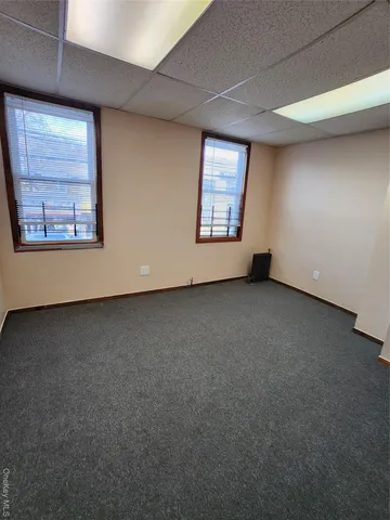 a bathroom with a tub sink a toilet and vanity