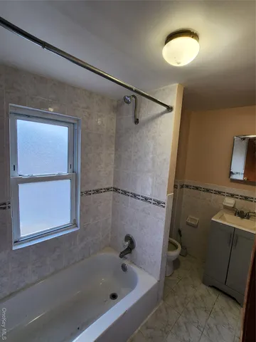 a bathroom with a bathtub