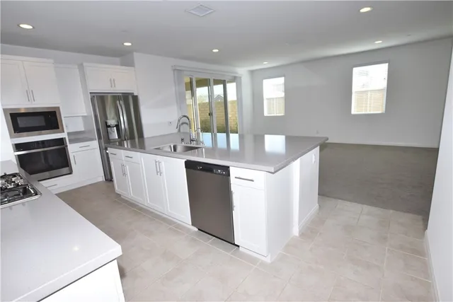 a bathroom with a double vanity sink and mirror