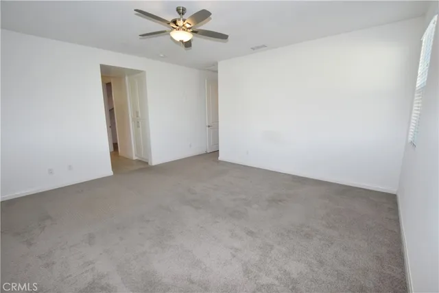 a view of a house with a swimming pool and yard