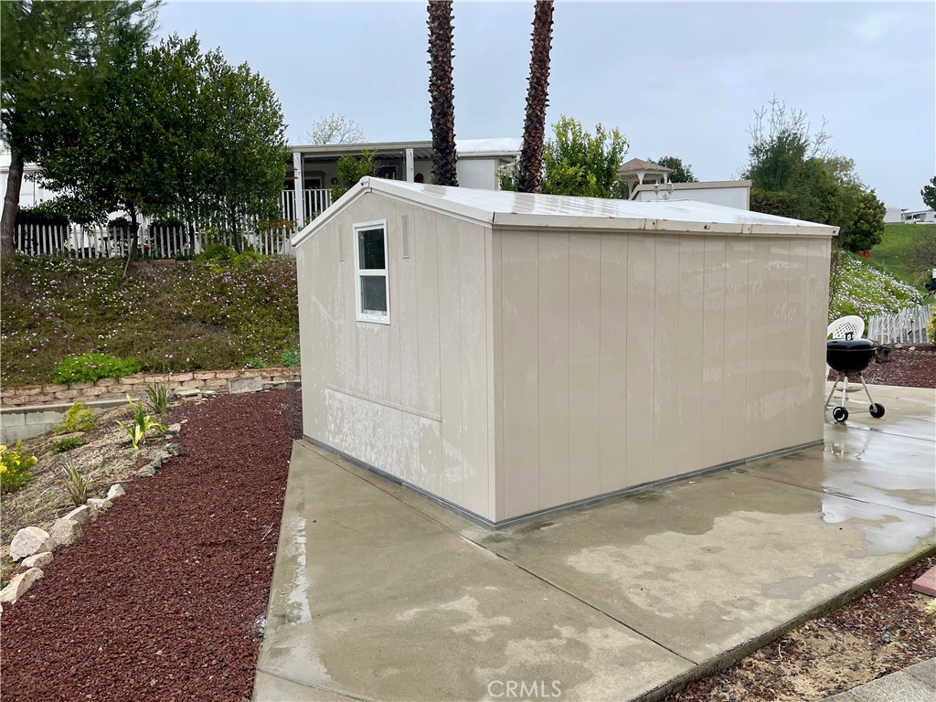 31130 South General Kearny Road, Unit 145 Temecula, CA 92591 - Photo 19 of 27 a view of a house with backyard