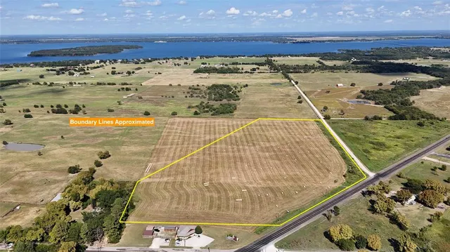 a view of an ocean and a yard