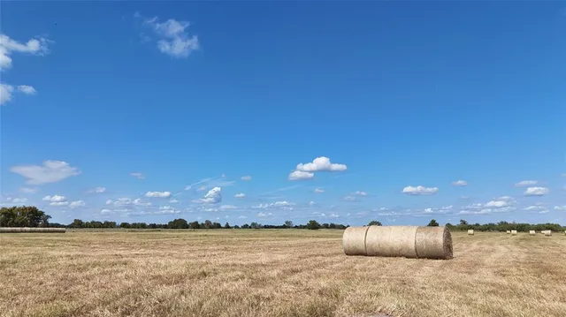 a view of an ocean and sunset