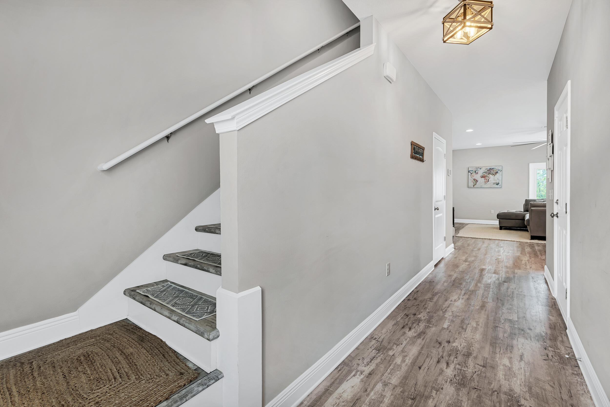 89 Crossing Lane, Unit F Santa Rosa Beach, FL 32459 - Photo 15 of 37 a view of livingroom with furniture and wooden floor