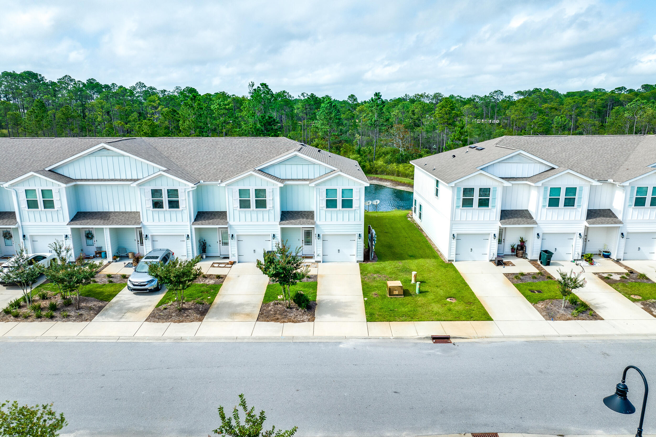 89 Crossing Lane, Unit F Santa Rosa Beach, FL 32459 - Photo 3 of 37 an aerial view of a house