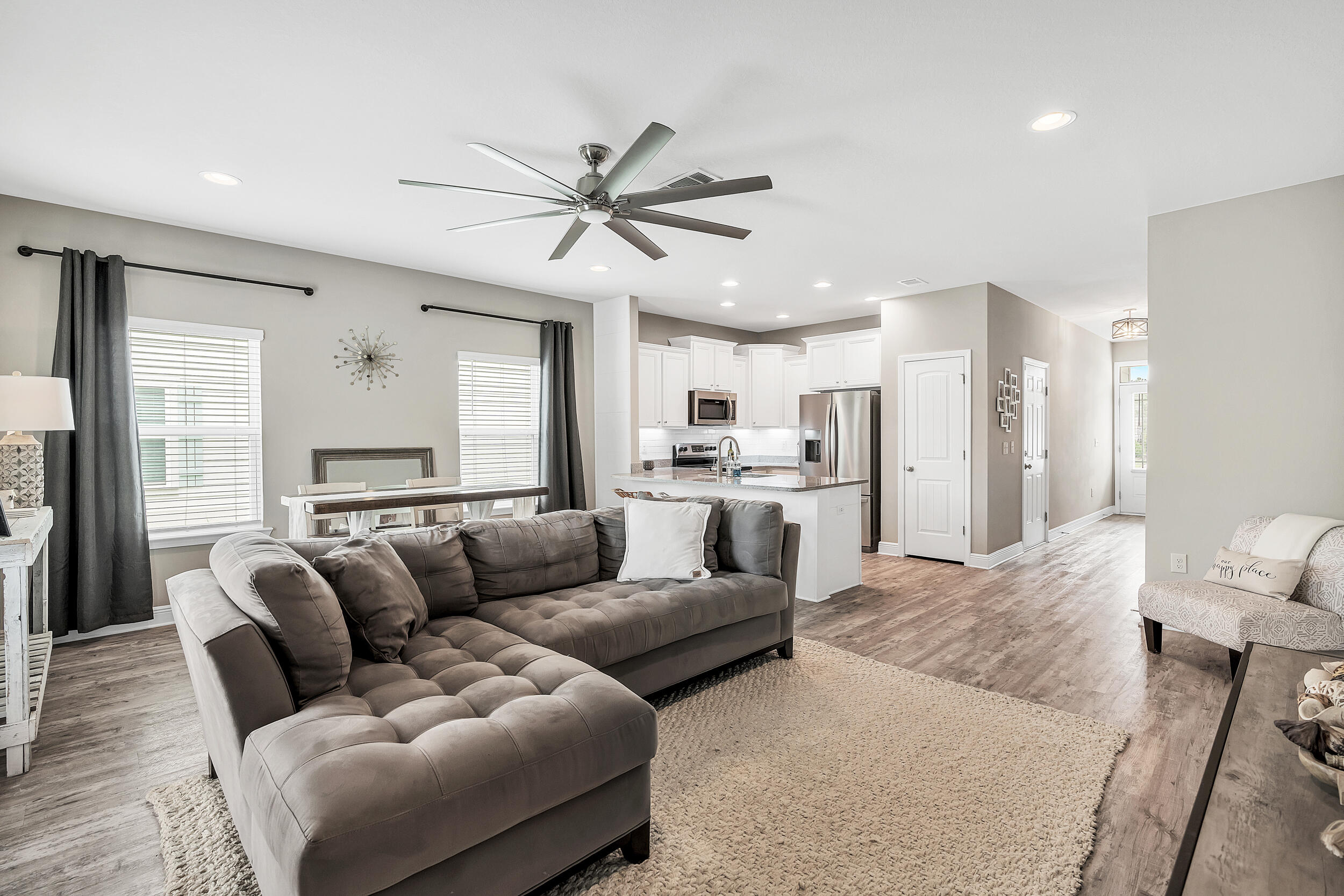 89 Crossing Lane, Unit F Santa Rosa Beach, FL 32459 - Photo 5 of 37 a living room with furniture white walls and white walls