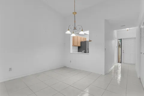 a view of empty room with front door