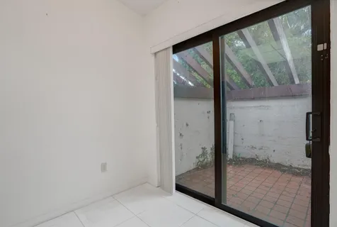 a view of livingroom with washer and dryer