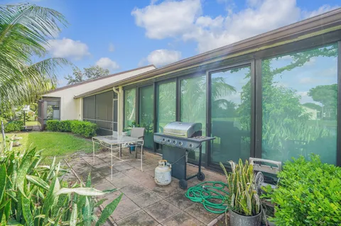 a view of a lake with houses in the back