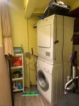 a view of a chairs and table in the patio