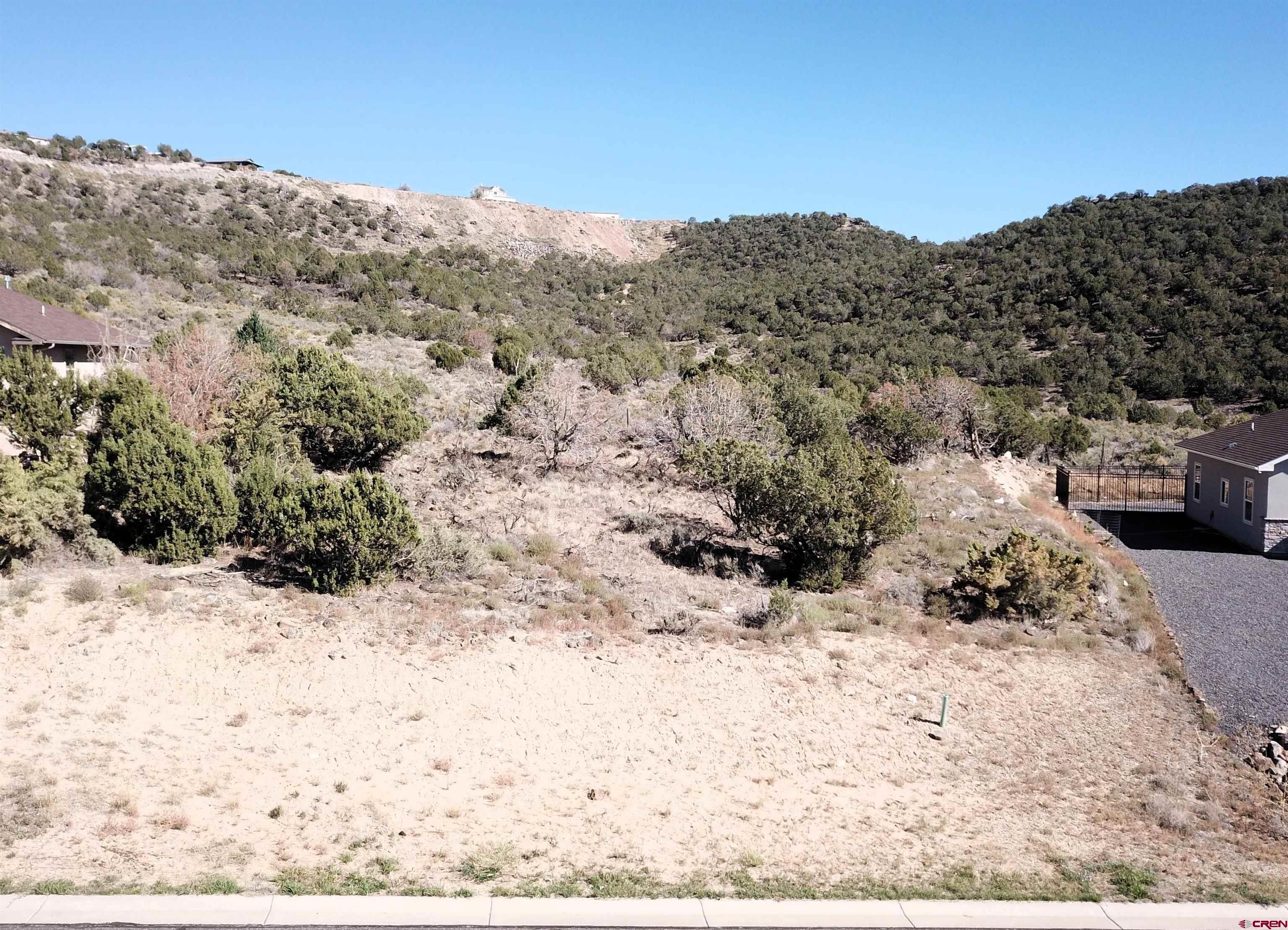 725 Southeast Pine Street Cedaredge, CO 81413 - Photo 6 of 11 a view of a backyard of a house