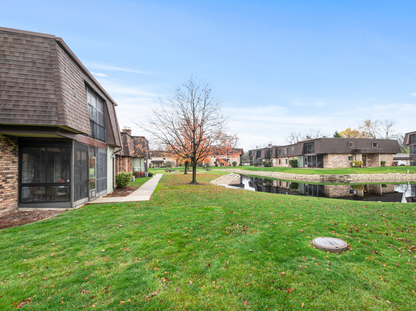 11136 NW Road, Unit D Palos Hills, IL 60465 - Photo 23 of 23 a view of a house with a yard porch and sitting area