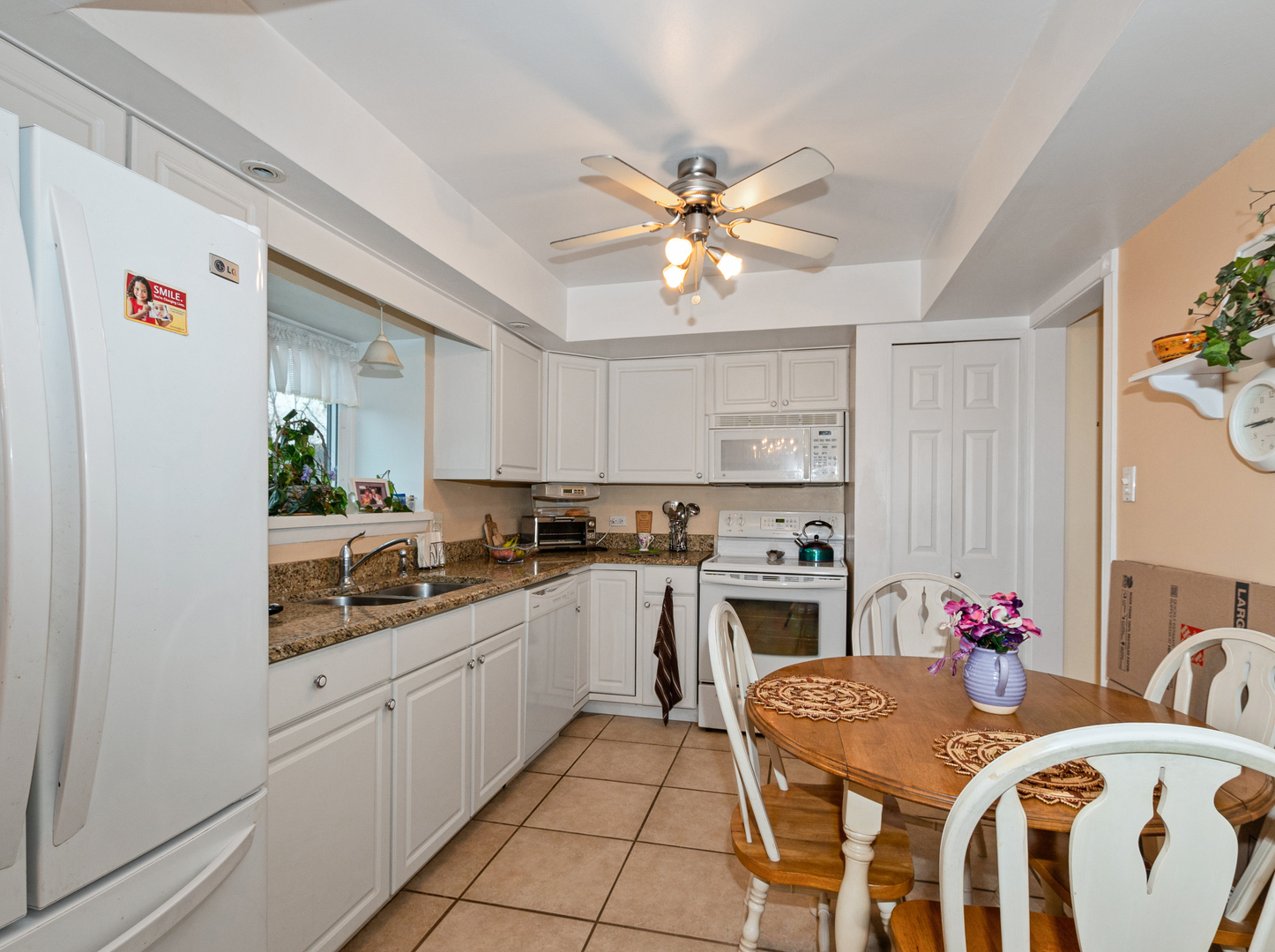 11136 NW Road, Unit D Palos Hills, IL 60465 - Photo 10 of 23 a kitchen with stainless steel appliances a stove a sink dishwasher and cabinets