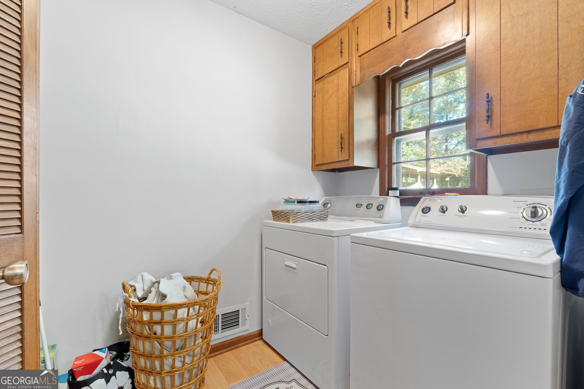 5162 Kurt Lane Southwest Conyers, GA 30094 - Photo 16 of 37 a bathroom with a sink and a window