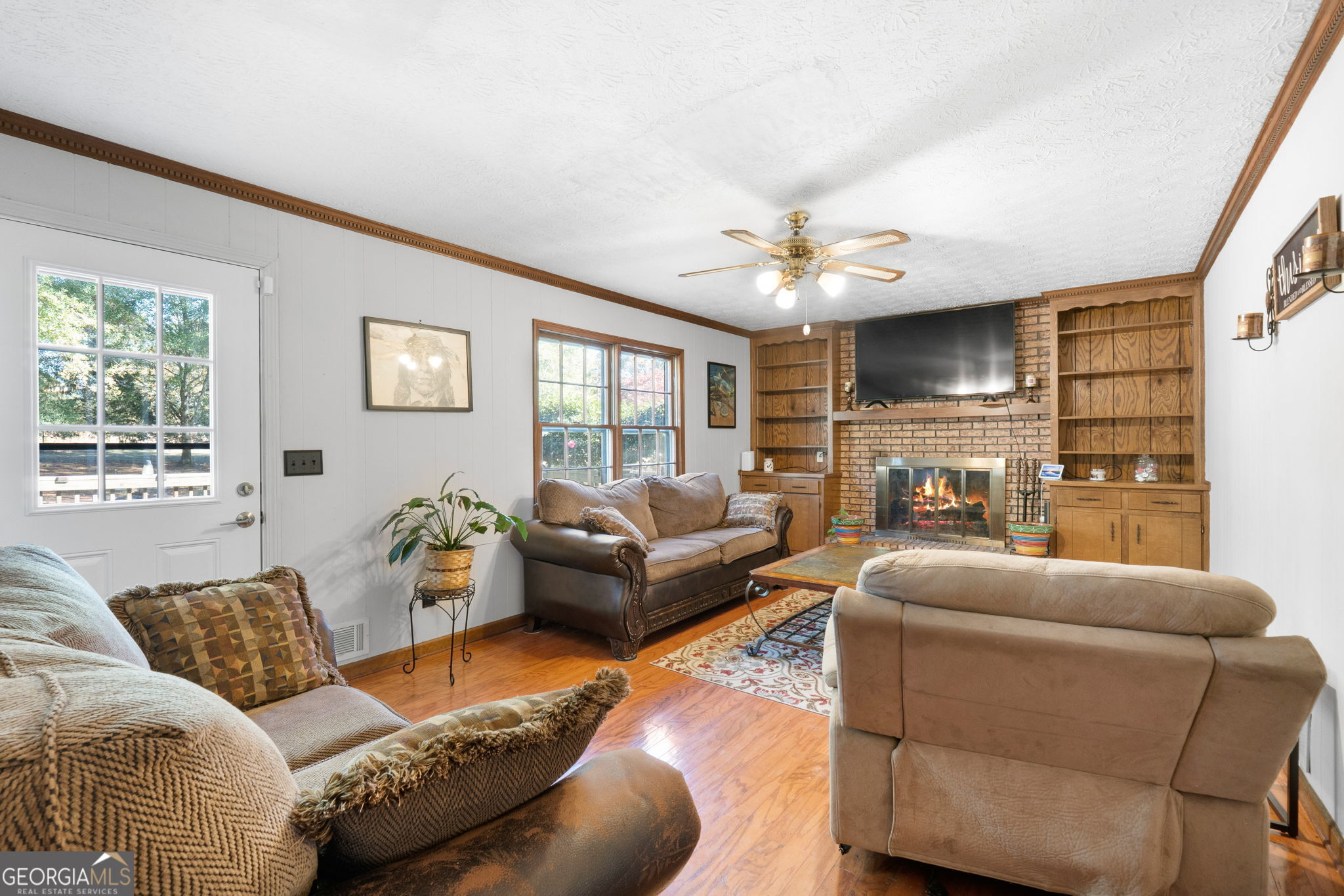 5162 Kurt Lane Southwest Conyers, GA 30094 - Photo 17 of 37 a living room with furniture and a large window