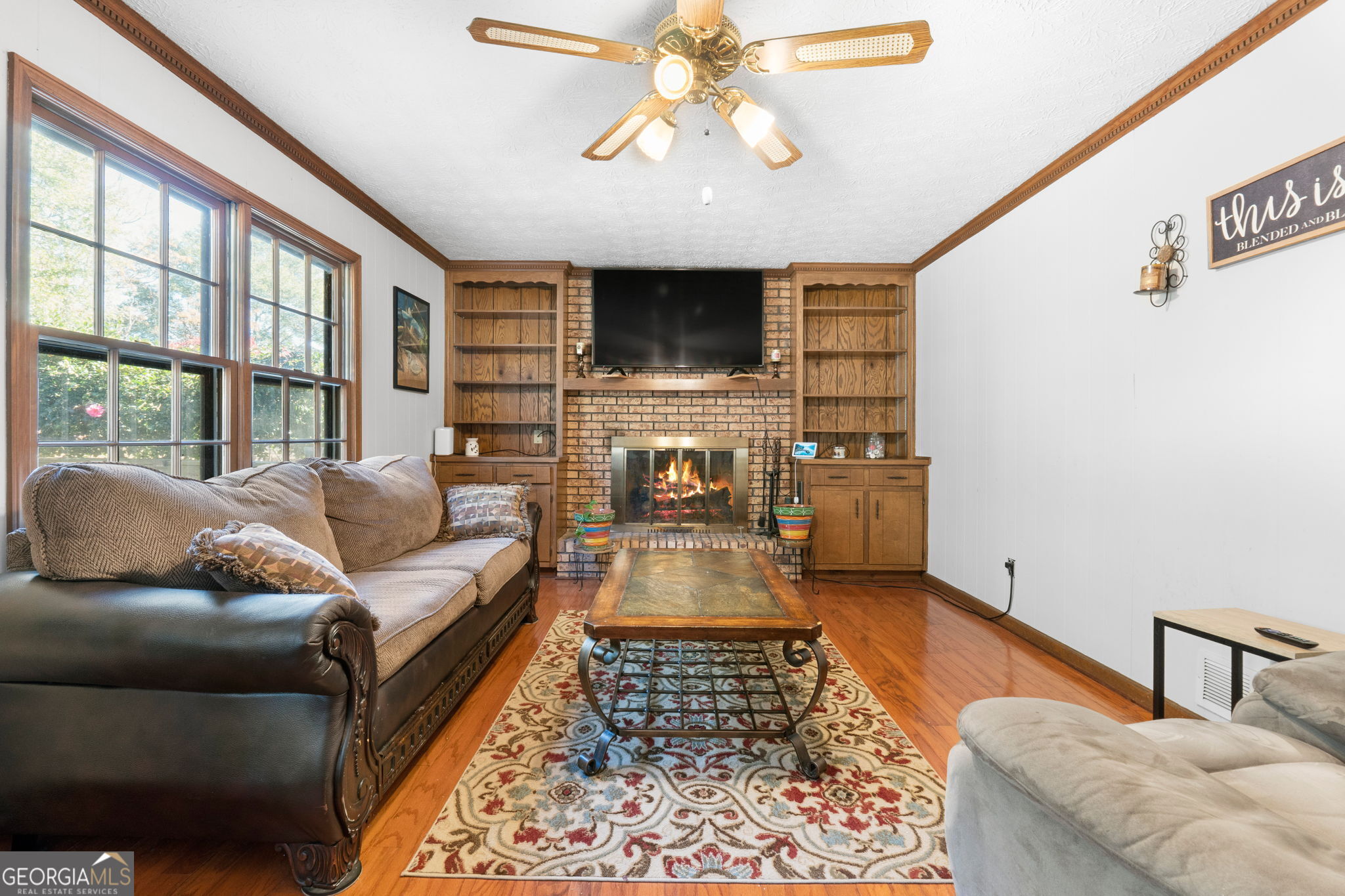 5162 Kurt Lane Southwest Conyers, GA 30094 - Photo 18 of 37 a living room with furniture and a flat screen tv