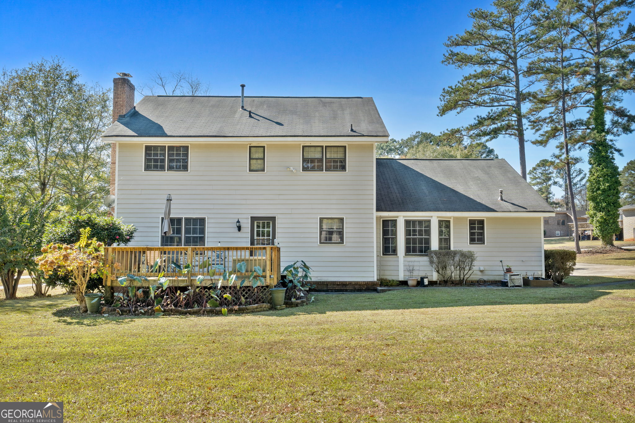 5162 Kurt Lane Southwest Conyers, GA 30094 - Photo 33 of 37 a front view of a house with garden