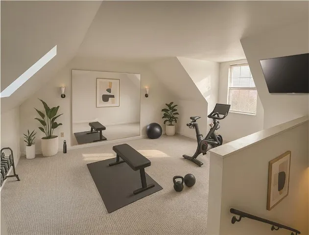 a view of storage and utility room with washer and dryer