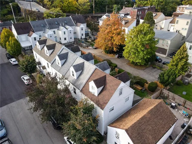 an aerial view of a city with lots of residential buildings