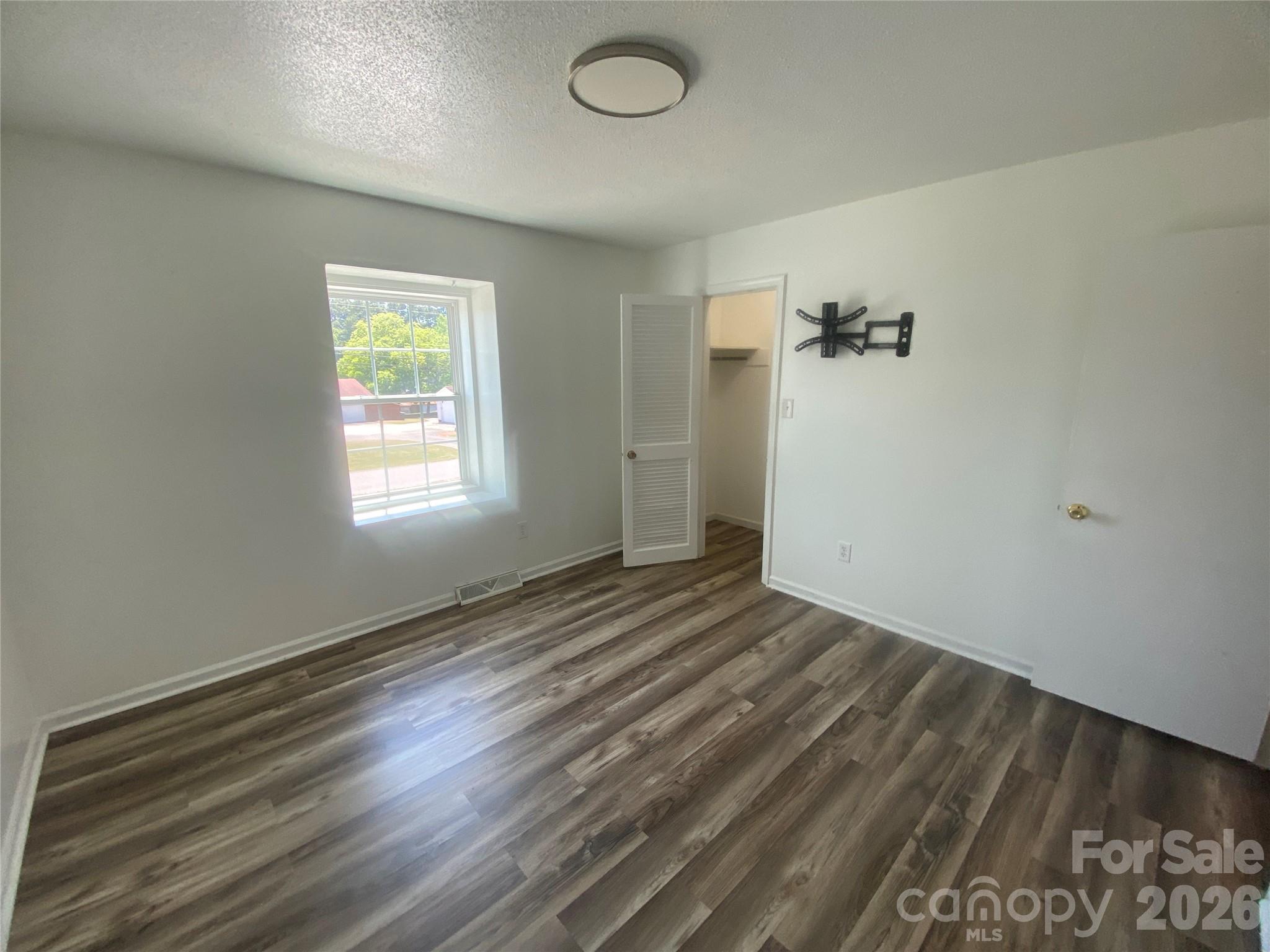 788 Coley Road Salisbury, NC 28146 - Photo 27 of 43 an empty room with windows
