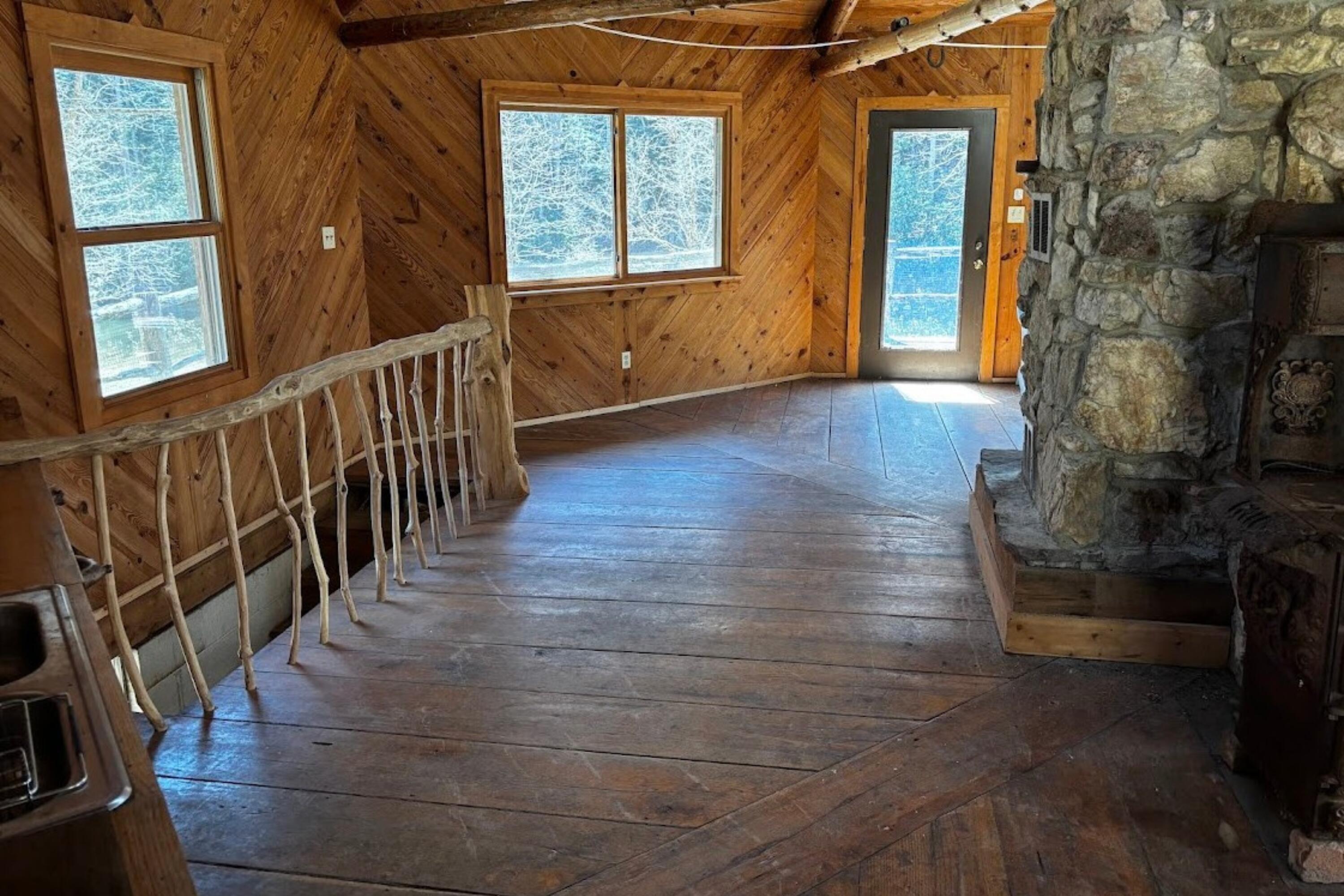5600 Chestnut Ridge Road Riner, VA 24149 - Photo 13 of 23 a view of entryway with wooden floor and stairs